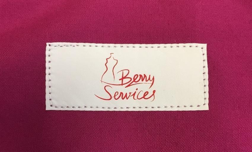 Application and sewing of brand labels : Berry Services