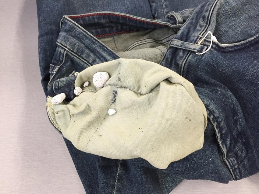 Pumice stones in jeans
